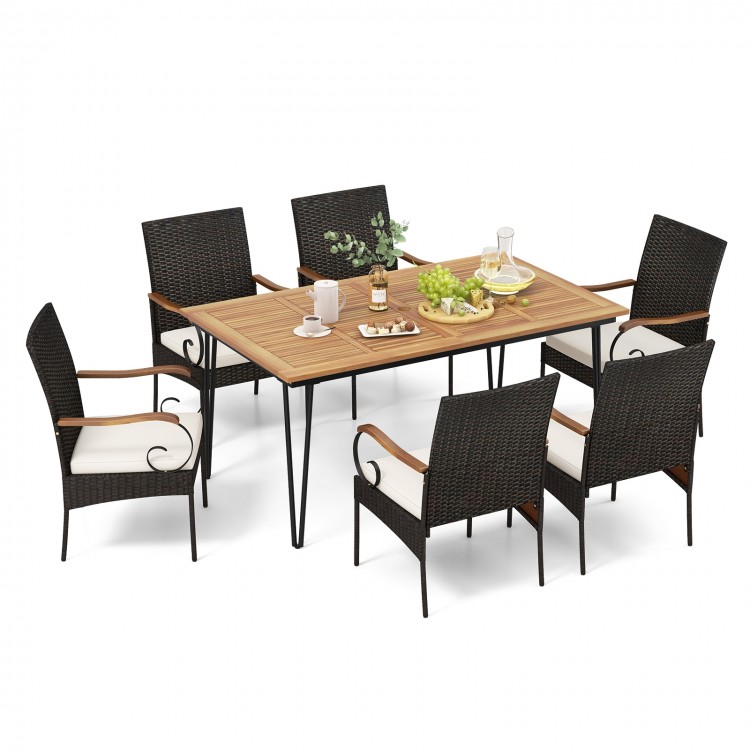 7-piece patio dining set featuring a rectangular acacia wood table and 6 rattan armchairs with soft cushions for.