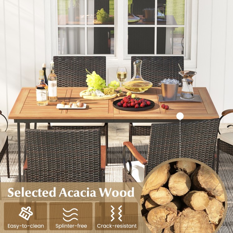 7-piece patio dining set featuring an acacia wood table and rattan armchairs with soft cushions, ideal for outdoor.