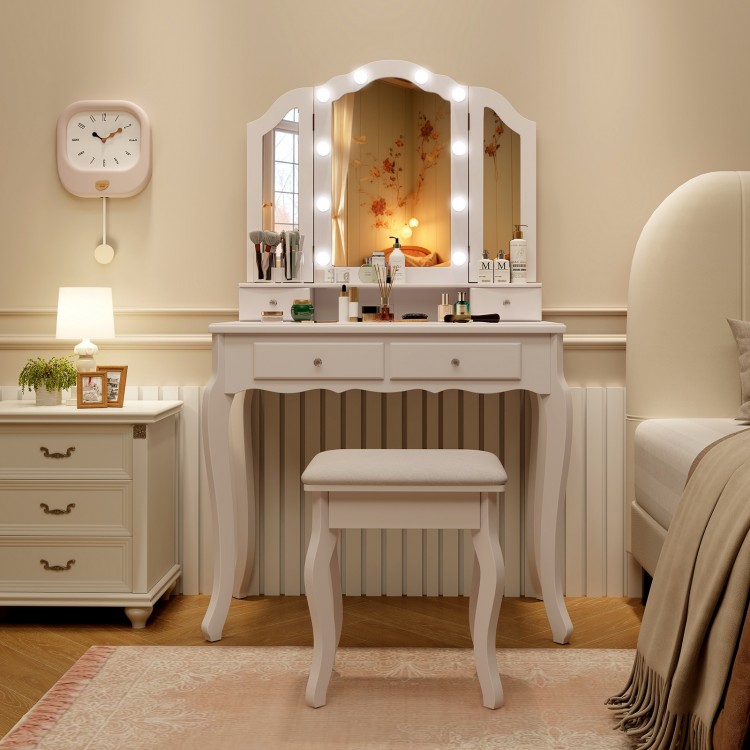 Makeup vanity table set in white with lighted tri-folding mirror, cushioned stool, and spacious storage drawers.