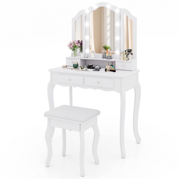 Makeup vanity table set in white with tri-folding lighted mirror, drawers, and cushioned stool for elegant storage.