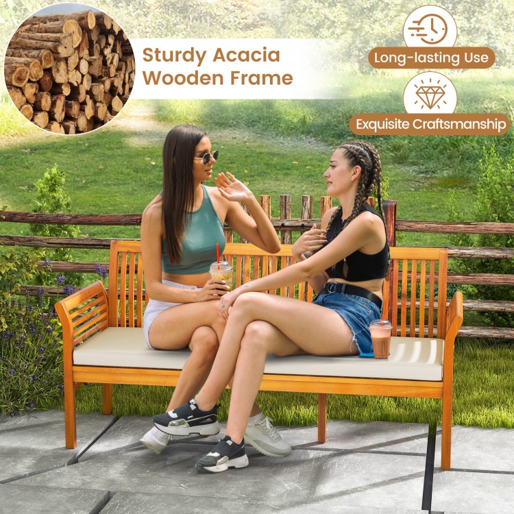 Patio 3-seat wood bench with soft seat cushions, made of acacia wood, ideal for garden or backyard relaxation.