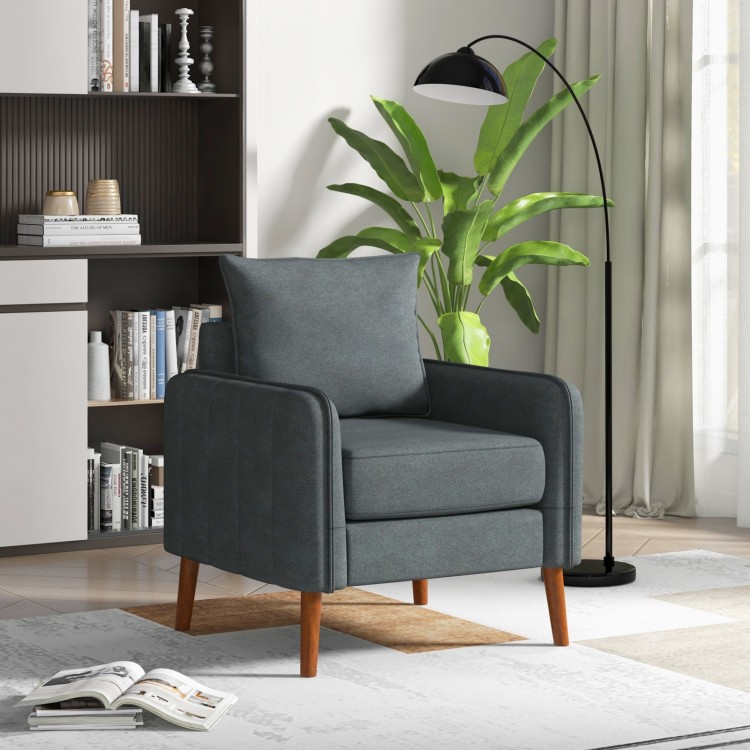 Gray fabric upholstered sofa chair featuring detachable cushions, stylish mid-century design, perfect for reading or.