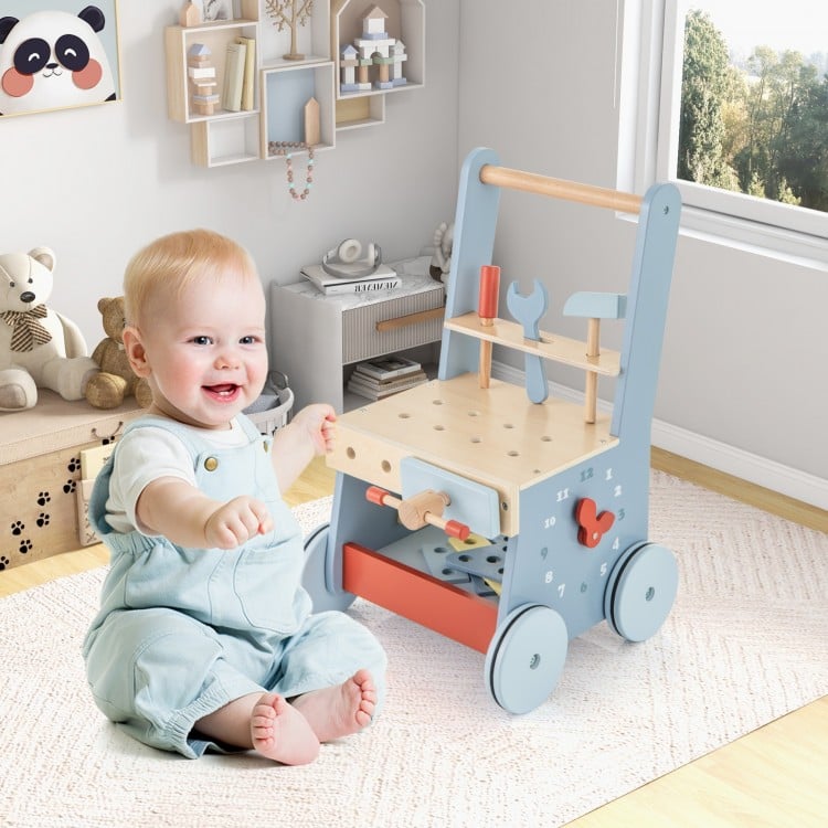 Toddler wooden push walker with activity center, featuring mini tools, shape sorters, and a stable 4-point base for.