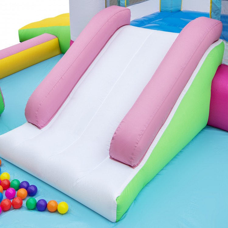 Inflatable bounce house slide in pink and green, made of waterproof 420D Oxford cloth, perfect for outdoor fun.