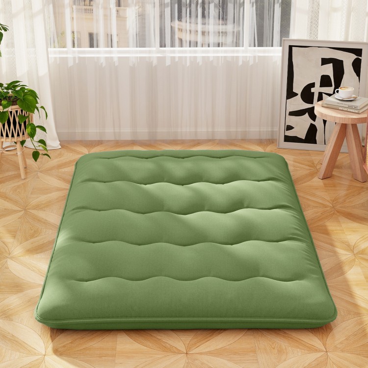 Full-size green floor mattress with washable cover, featuring quilted design for comfort, ideal for camping or yoga.