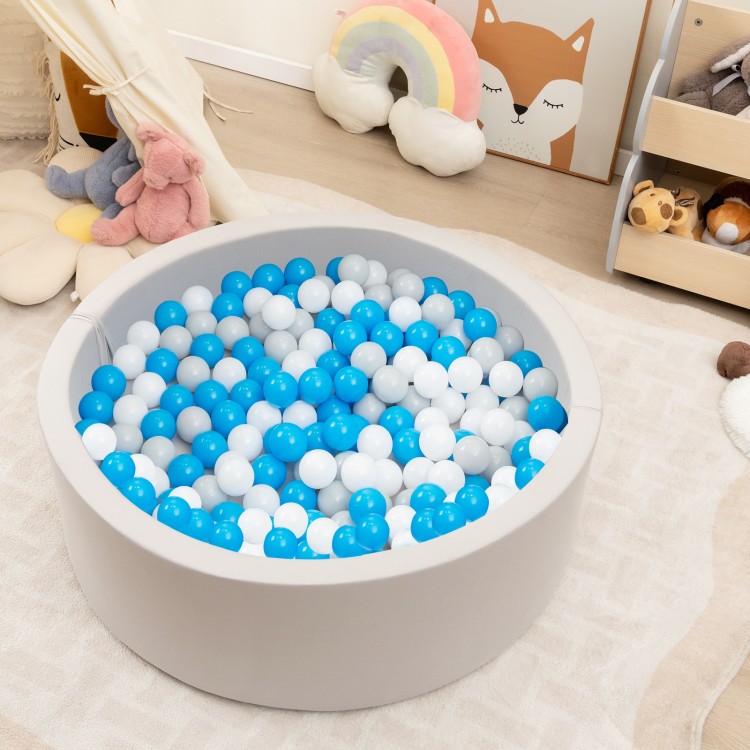 Soft gray kiddie ball pit filled with 200 BPA-free ocean balls, perfect for kids' playrooms or nurseries.