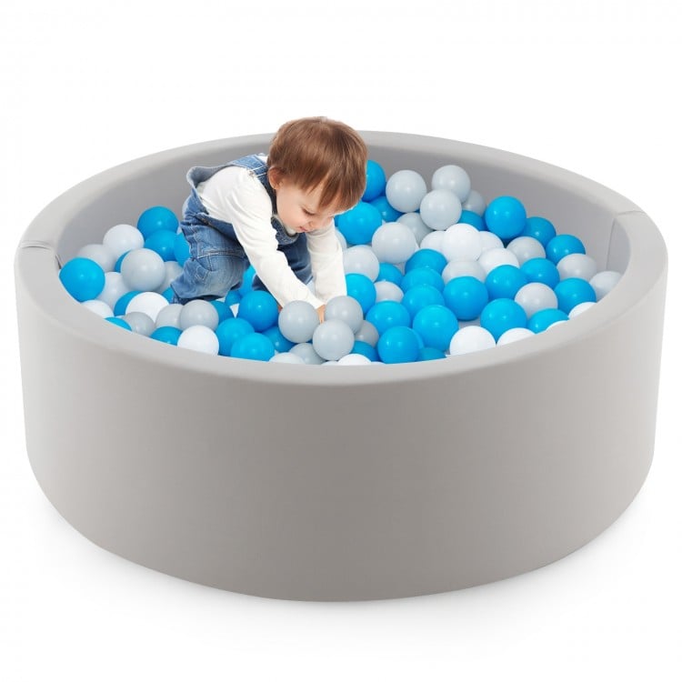 Soft gray Kiddie Baby Playpen filled with 200 ocean balls, perfect for interactive play in living rooms or nurseries.