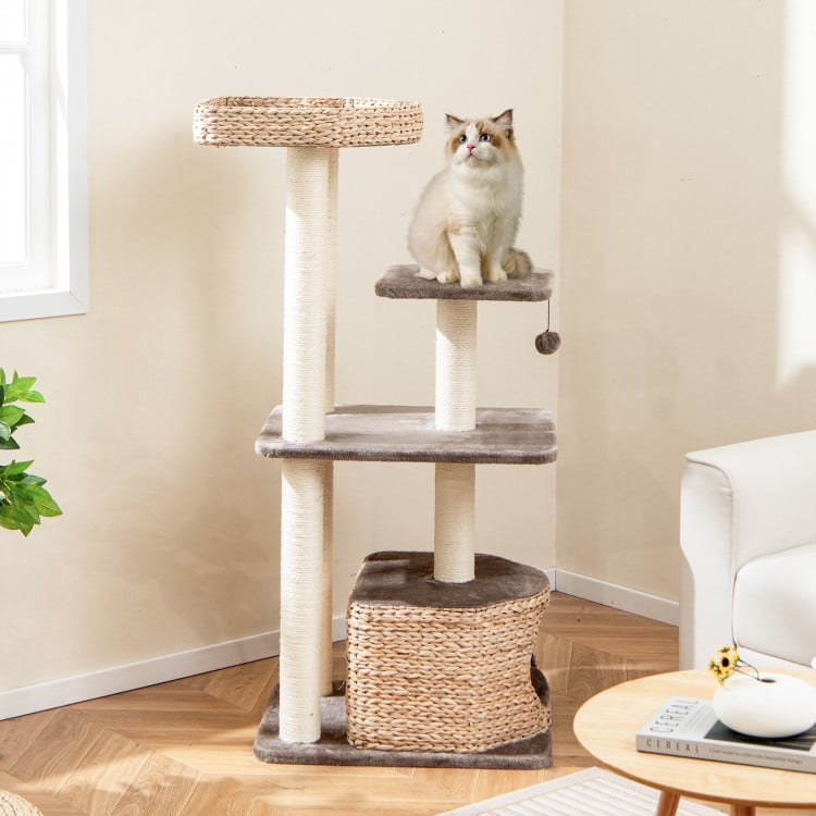 4-layer cat tower in coffee color with scratching posts, cozy condo, and washable cushions for playful cats.
