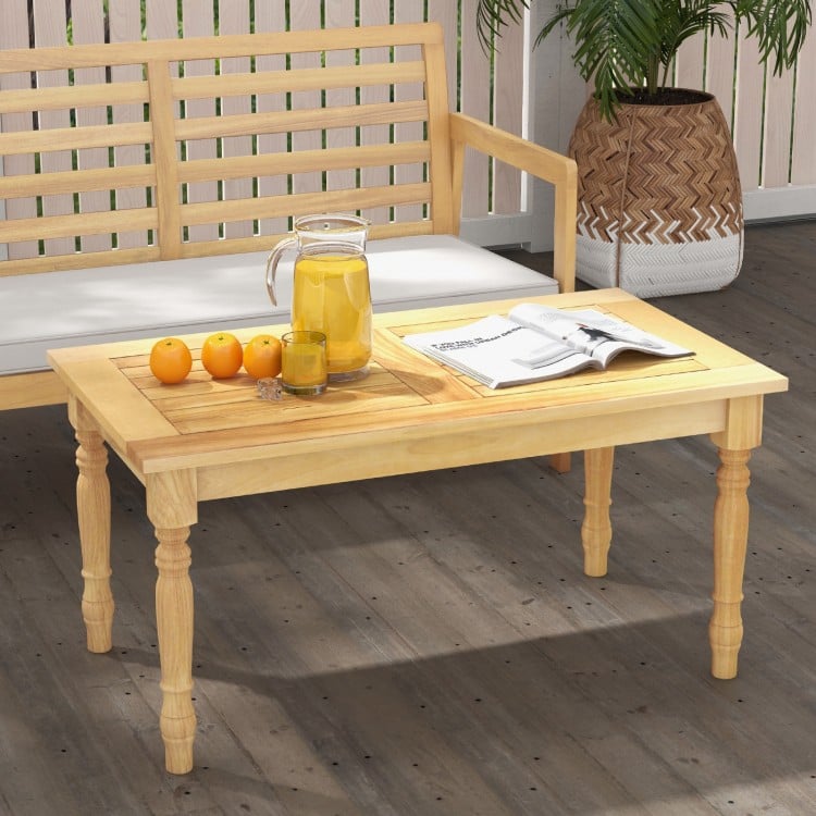 Patio coffee table with solid teak wood structure and slatted tabletop, perfect for indoor or outdoor use.