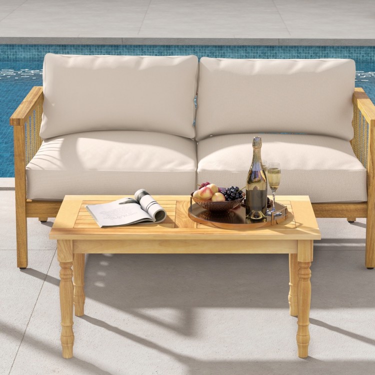 Patio coffee table with solid teak wood structure, slatted tabletop, and smooth surface, perfect for indoor and outdoor.