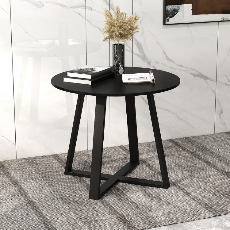 Mid-century black round dining table with pedestal base, featuring a waterproof MDF top and elegant design for dining.