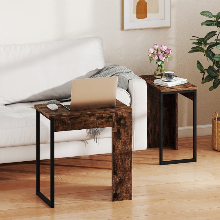 Close-up view of a rustic brown nesting coffee table showcasing the smooth, waterproof surface and stylish faux wood.