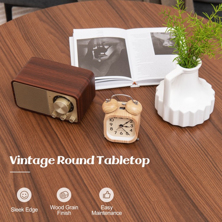 Vintage round coffee table with wood grain finish, heavy-duty metal frame, and sleek edge for easy maintenance.