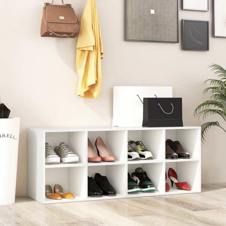White 8 cubbies shoe organizer showcasing various shoes, with a spacious top for sitting, ideal for hallways or.