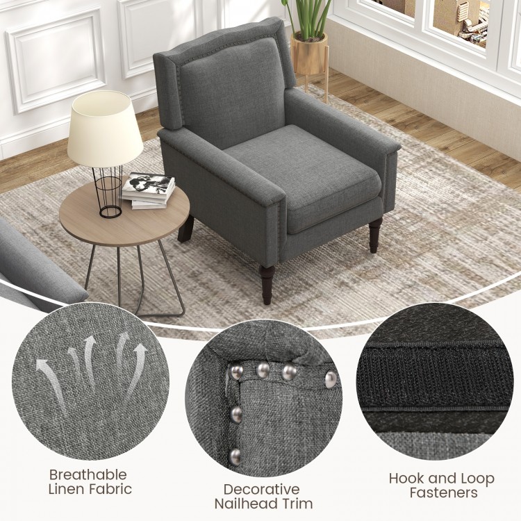 Mid-century modern armchair in gray linen fabric with decorative nailhead trim, ideal for living rooms and relaxation.
