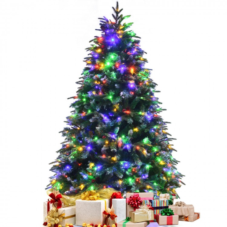 Snowy 5 ft pre-lit Christmas tree with multi-color LED lights and presents underneath for festive holiday decoration.