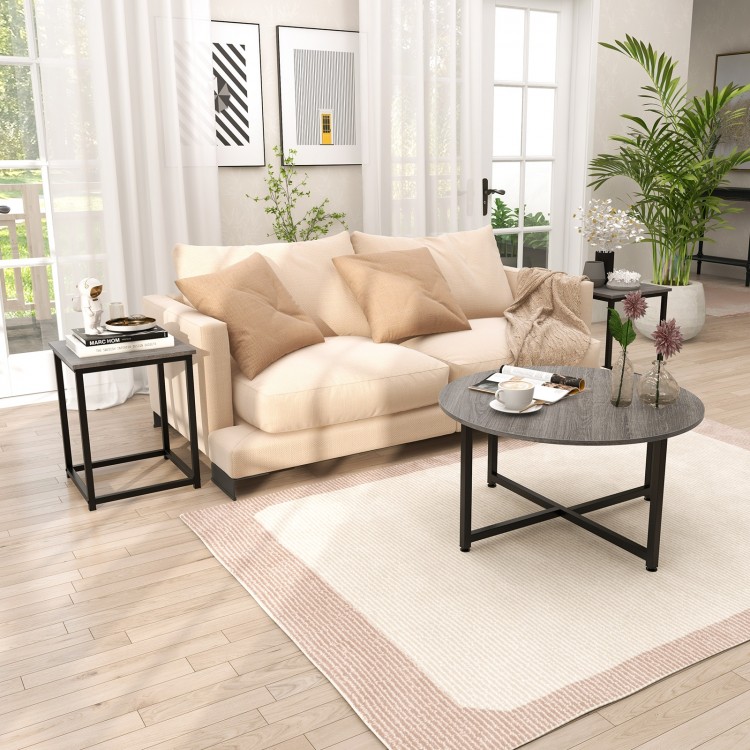 Gray round coffee table with two square end tables, featuring a textured surface and sturdy metal frame for living room.