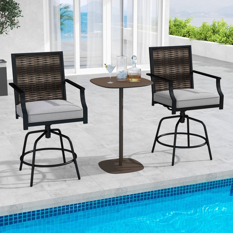 Set of 2 outdoor PE wicker swivel bar stools with grey cushions, perfect for poolside relaxation and socializing.