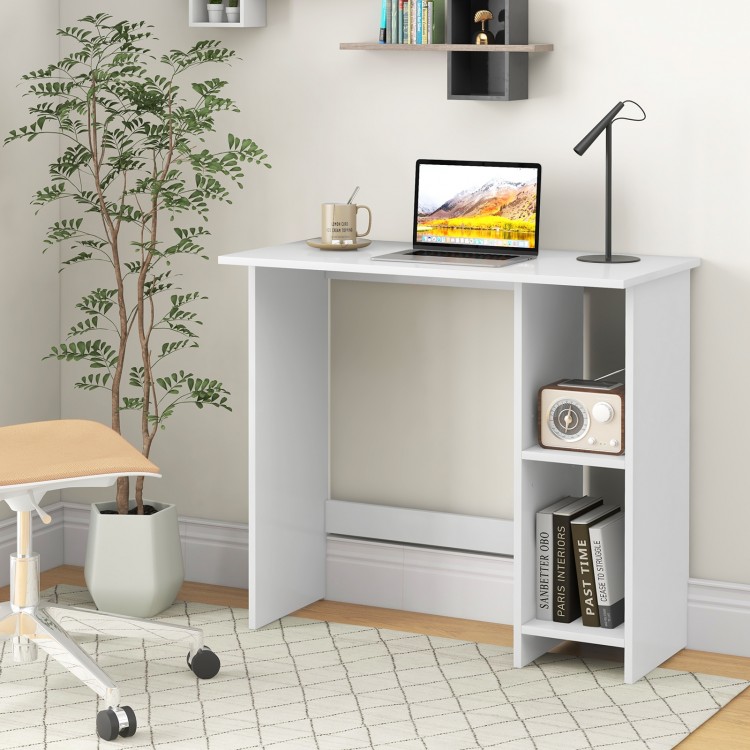 Small white computer desk with adjustable shelf, perfect for space-saving in small apartments and home offices.