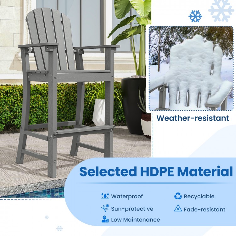Counter height outdoor HDPE bar stool in gray with armrests and footrest, designed for all-weather durability.