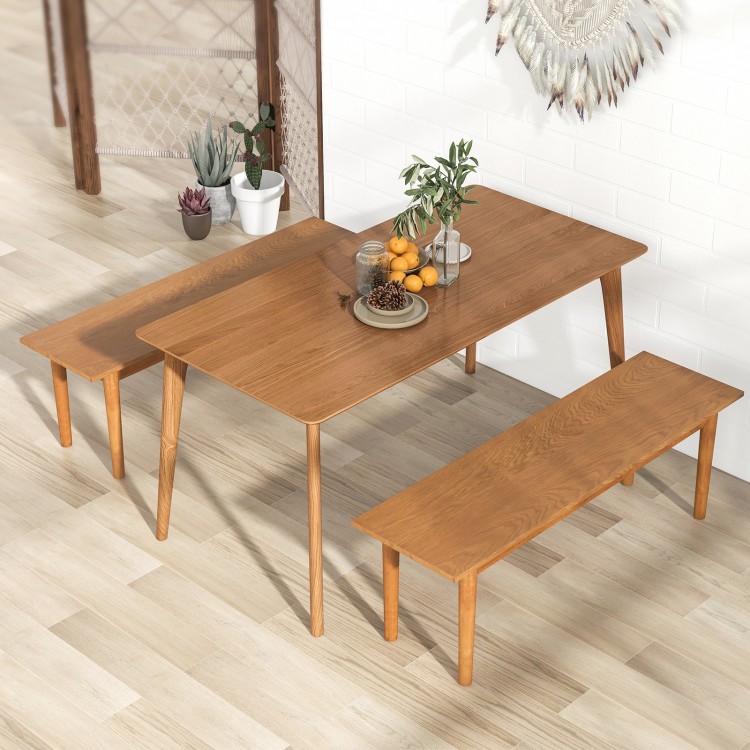 Solid wood dining bench with rubber wood legs, 55" long, ideal for entryways or dining areas, featuring a smooth.