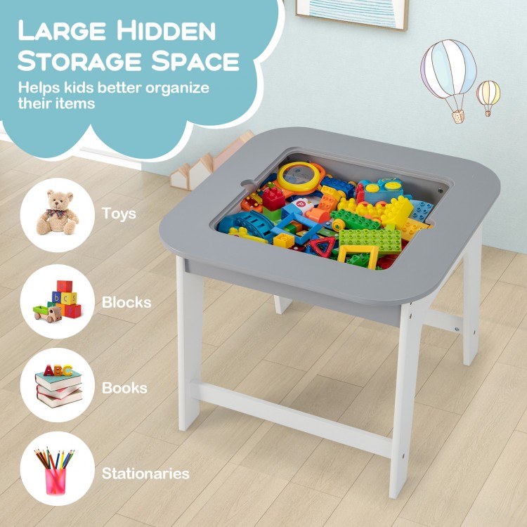 Kid's gray table and chairs set with double-sided tabletop, ideal for drawing and play, featuring large hidden storage.