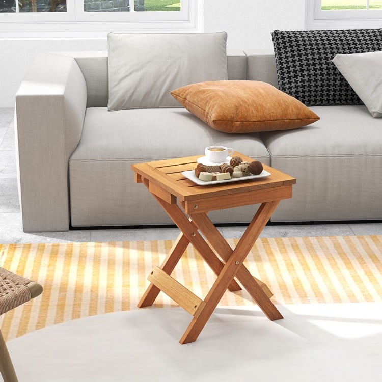 Compact 14-inch folding side table with slatted hardwood top, ideal for living room or outdoor use.