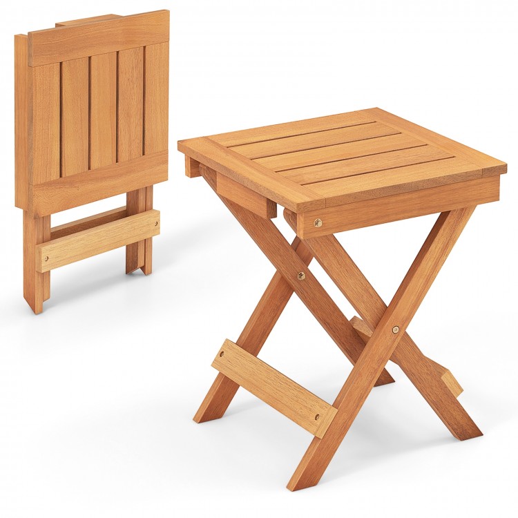 Compact 14-inch folding side table with slatted hardwood tabletop and X-shaped legs, ideal for backyard or camping use.