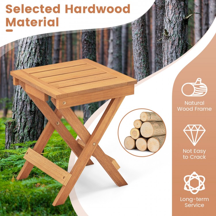 14-inch compact folding side table with slatted hardwood top, ideal for backyard and camping use, featuring X-shaped.