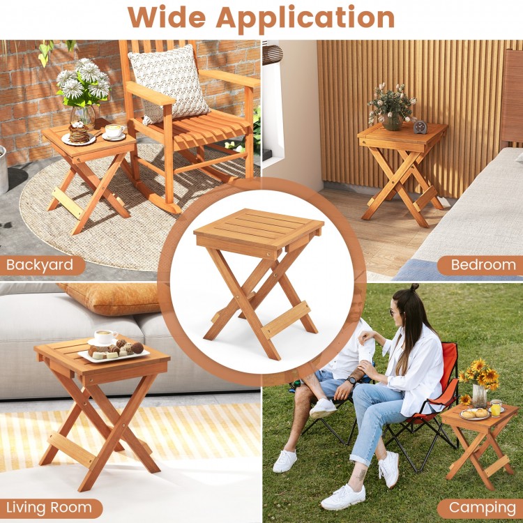 Compact 14-inch folding side table with slatted hardwood top, ideal for backyard, living room, or camping use.
