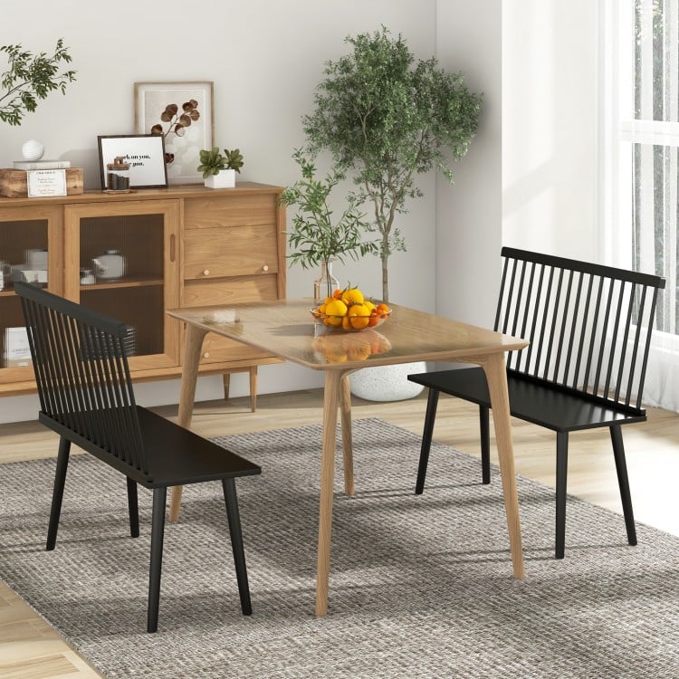 Black Dining Windsor Bench with spindle backrest, featuring a spacious seating surface for comfortable dining in any.