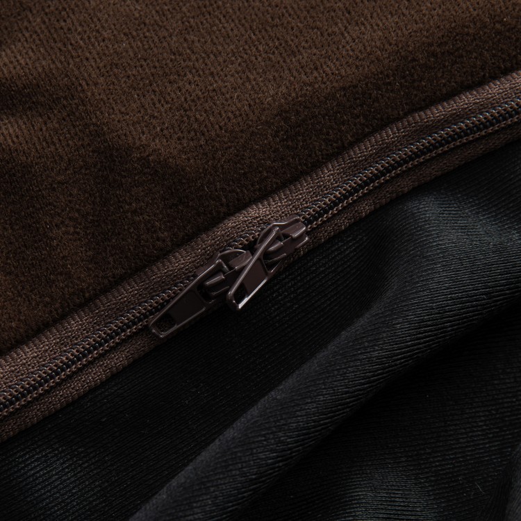 Close-up of the zipper detail on the brown backrest cushion, featuring soft PU material and elegant diamond patterns.
