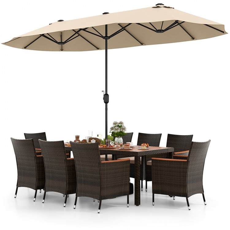 10-piece outdoor dining set featuring a large beige patio umbrella, rattan chairs, and acacia wood tabletop for.