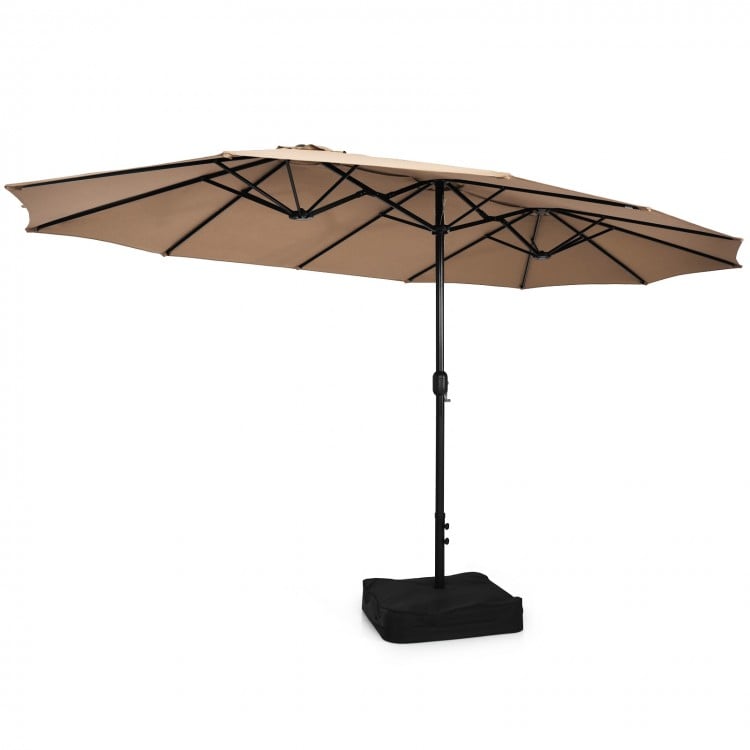 15 feet double-sided patio umbrella in brown with a sturdy base, perfect for outdoor dining and relaxation.