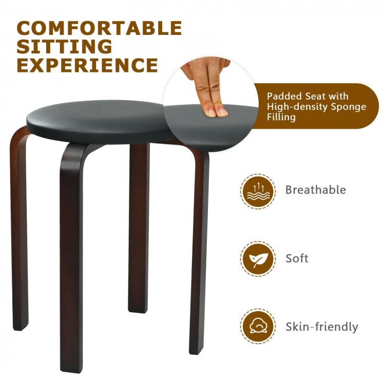 Round stool with padded seat in black, made of solid birch, stackable design for space-saving, ideal for dining use.