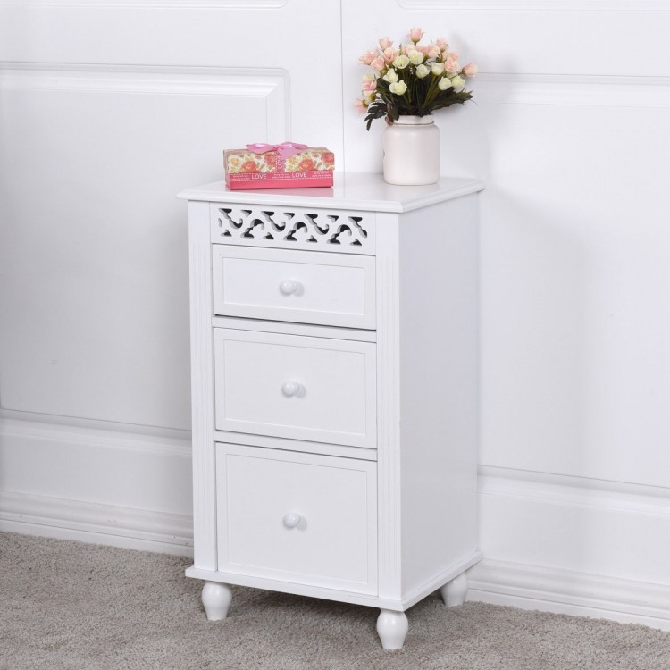 Front view of a white wooden storage cabinet featuring three drawers and elegant carved design, perfect for any room.