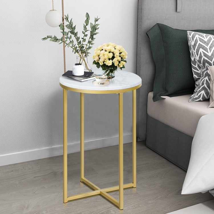 Round side table with faux marble top and gold metal legs, ideal for living room or bedroom decor.