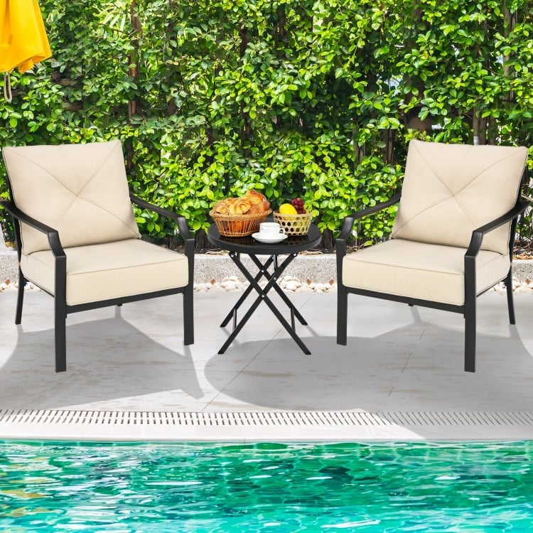Two padded outdoor chairs with armrests and a steel frame, perfect for patio relaxation and dining.