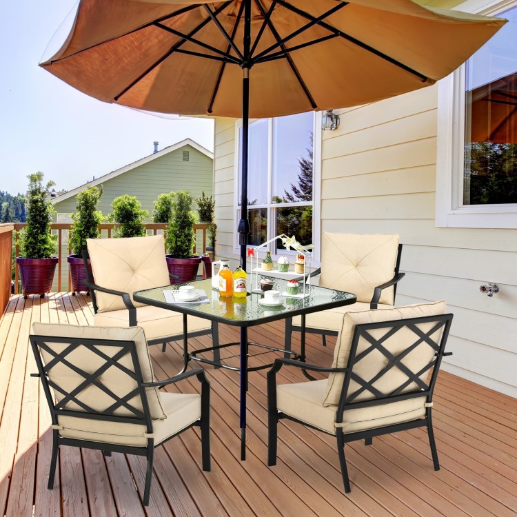 Patio dining set featuring two cushioned chairs with armrests and a sturdy steel frame, perfect for outdoor relaxation.