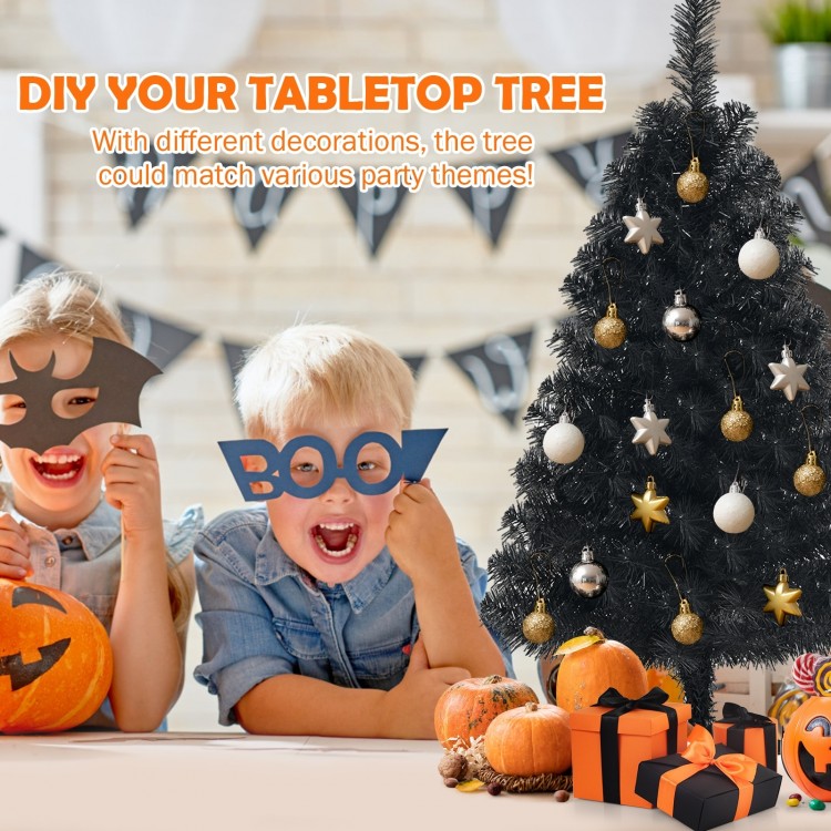 3 feet unlit black mini tree with plastic stand, perfect for DIY Halloween and Christmas decorations in small spaces.