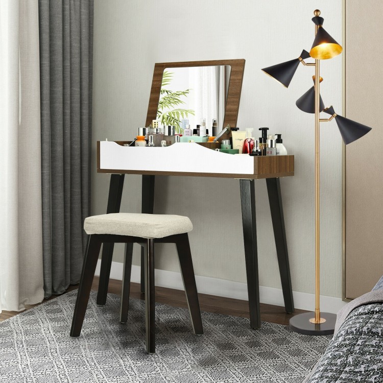 Vanity table set with flip-top mirror, brown finish, and padded stool, perfect for space-saving and dual-use as a desk.