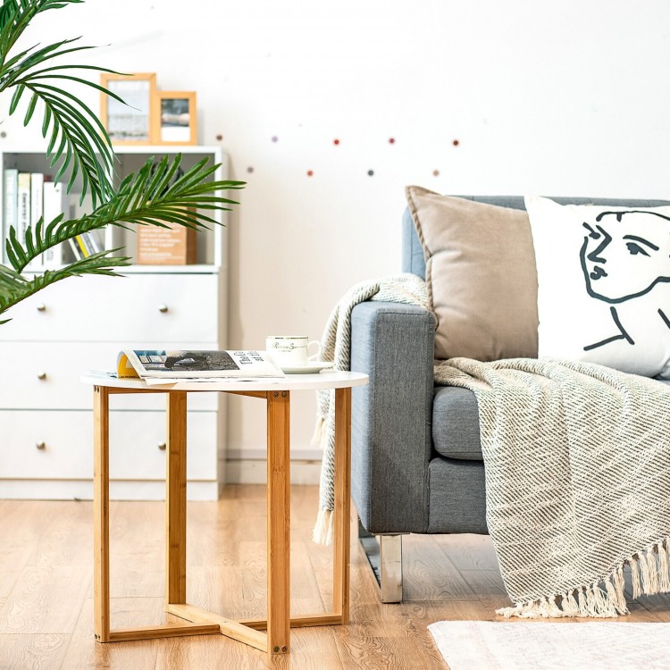 Round side end table with bamboo legs and X-shaped base, perfect for living room or bedroom use.