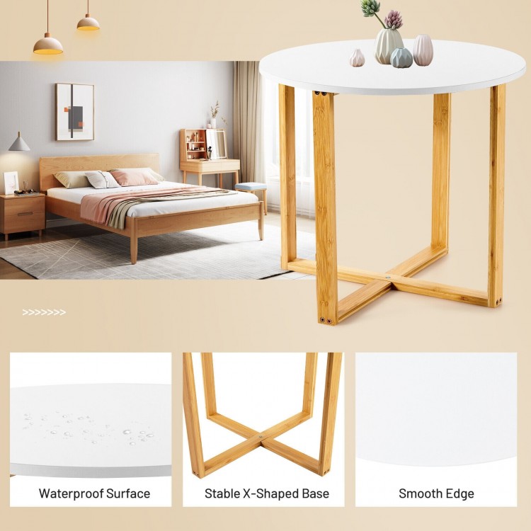 Round side end table with bamboo legs and X-shaped base, featuring a waterproof surface for versatile use in any room.