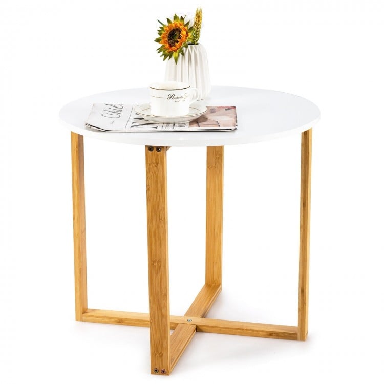 Round side end table with bamboo legs and X-shaped base, ideal for living room or bedroom, featuring a smooth.