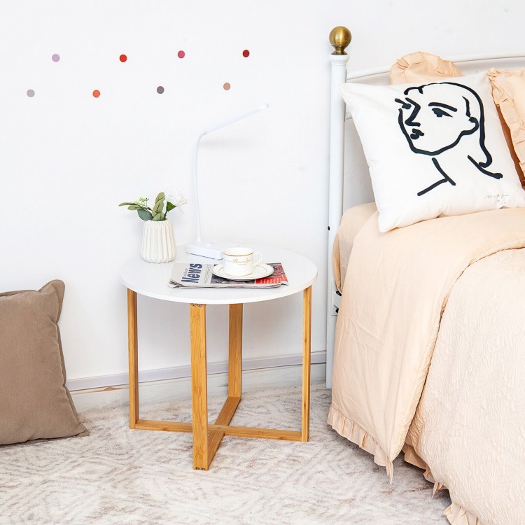 Round side end table with bamboo legs and X-shaped base, perfect for bedside or living room use.