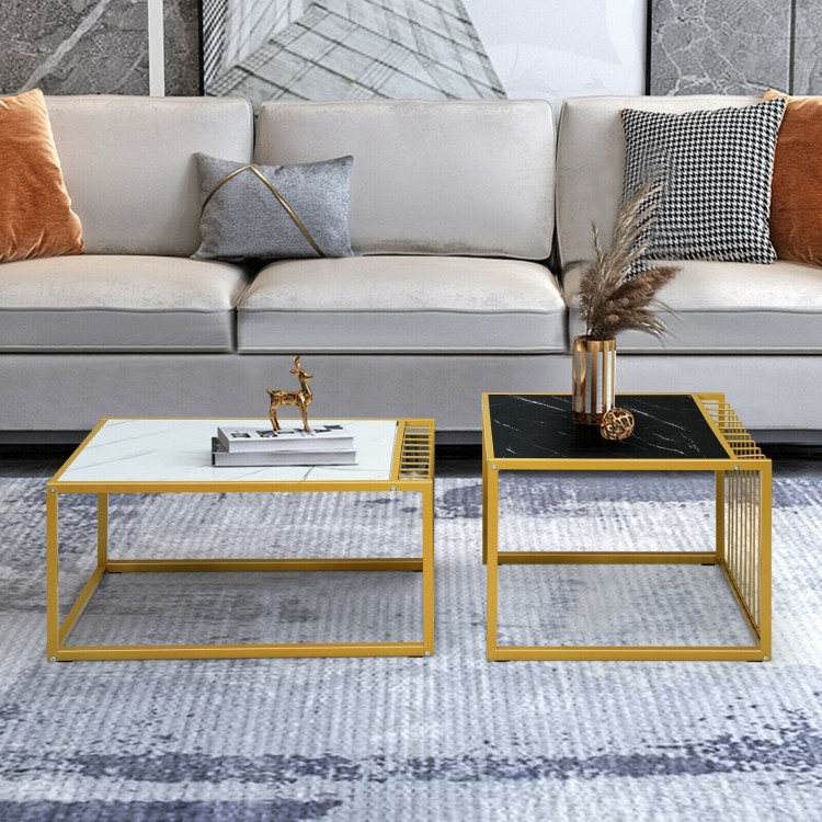 Modern stackable side tables with faux marble tops in black and white, featuring a sturdy gold metal frame for.