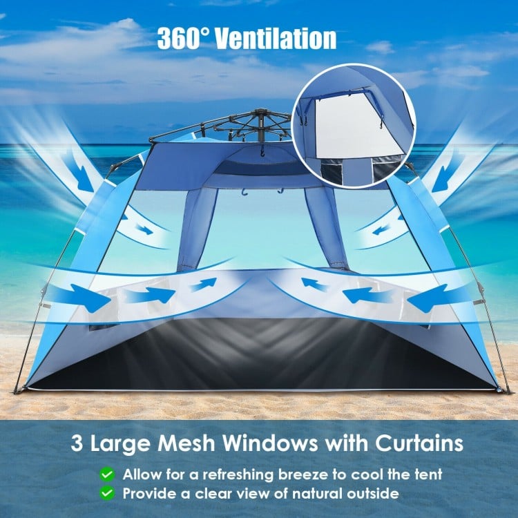 Easy pop-up beach tent in blue with 3 large mesh windows for 360° ventilation, accommodating 3-4 people.