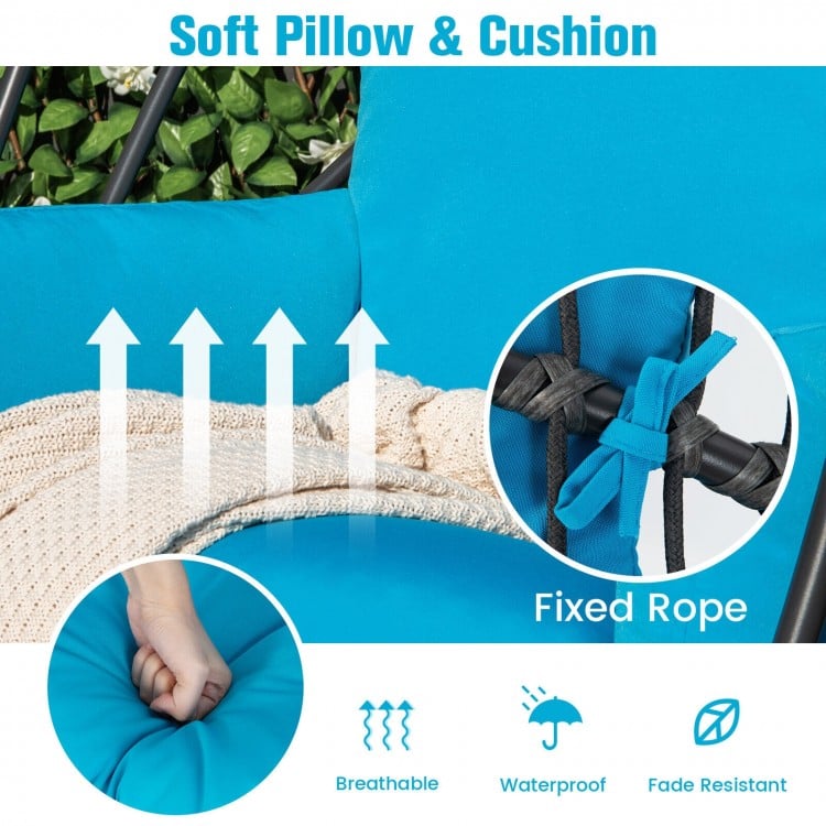 Soft turquoise cushion and pillow detail of the Hanging Folding Egg Chair, featuring fixed ropes for stability and.