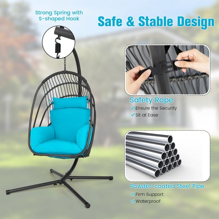 Hanging folding egg chair with turquoise cushion, durable steel frame, and safety rope for secure outdoor relaxation.