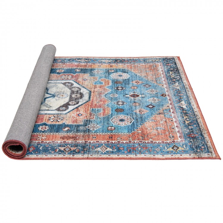Distressed vintage indoor area rug, 5 x 7 inches, with non-slip surface, perfect for living room or bedroom decor.